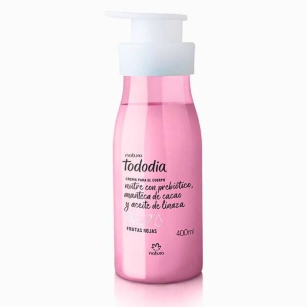 Envase de crema para el cuerpo Natura Tododia Frutas Rojas de 400 ml. La botella es de color rosado translúcido con un dispensador de bomba blanco. El texto destaca que nutre con prebiótico, manteca de cacao y aceite de linaza.
